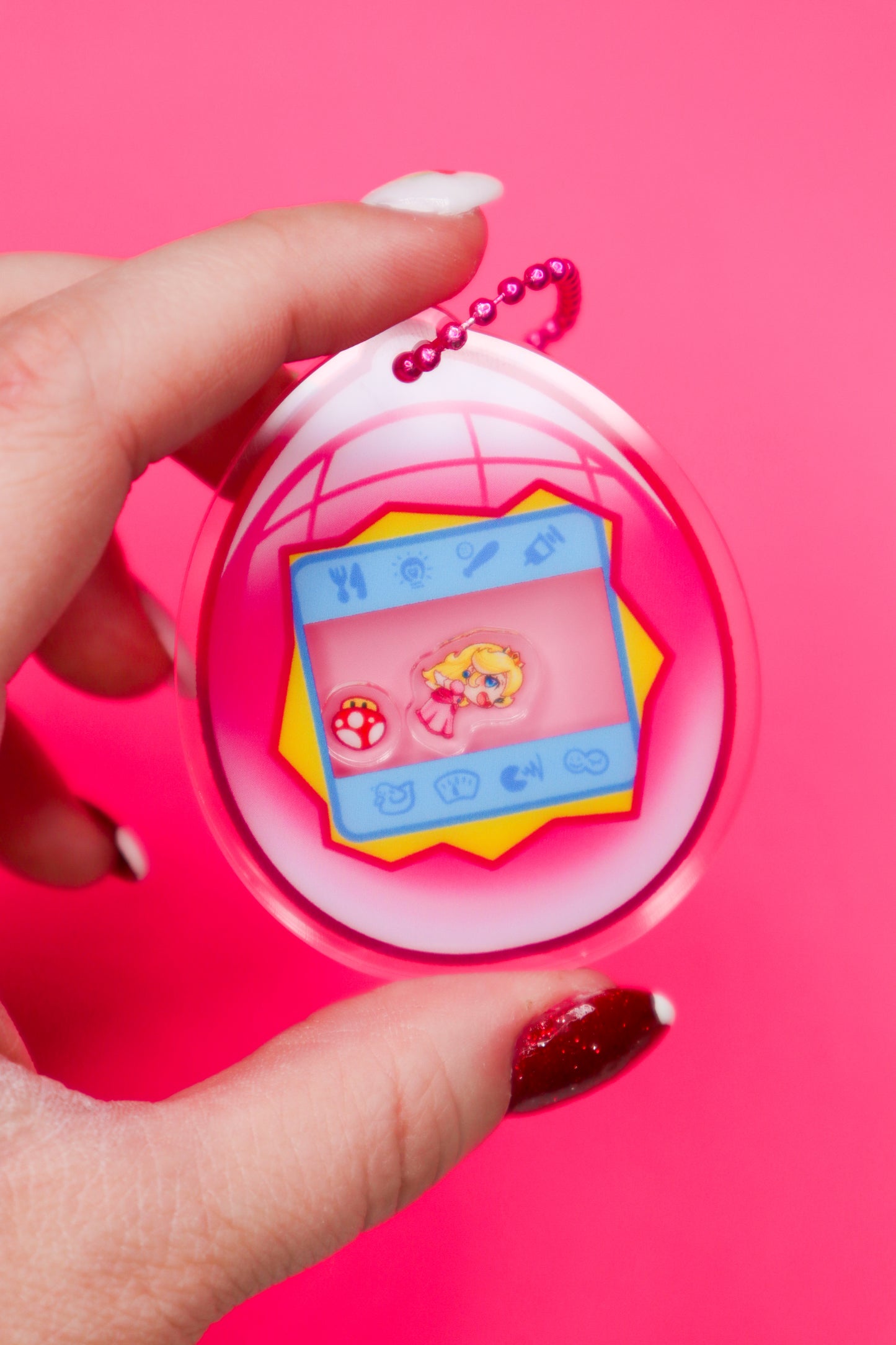 Princess Peach Tamagotchi Shaker Keychain