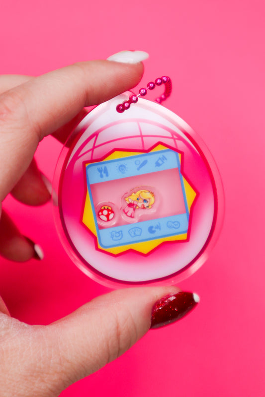 Princess Peach Tamagotchi Shaker Keychain